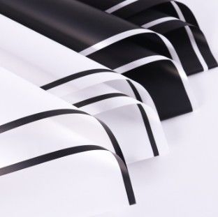 قیمت خوب کاغذ کادو گلدار مات اشرافی سیاه و سفید برای بسته بندی دسته گل در رنگ های زیاد آنلاین